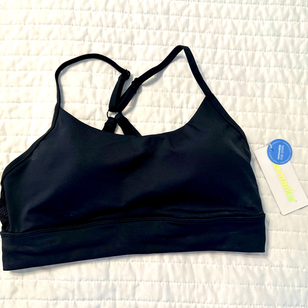 NWT SZ Large sports bra.  Black. Mint condition.